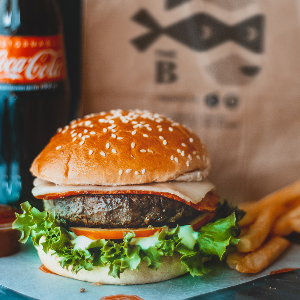 Identité de marque du restaurant The Burgler, fast-food spécialisé en burgers